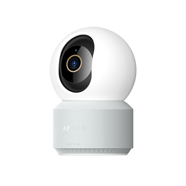 Indoor 4K CCTV dome camera with rotating lens, white housing and black sensor face