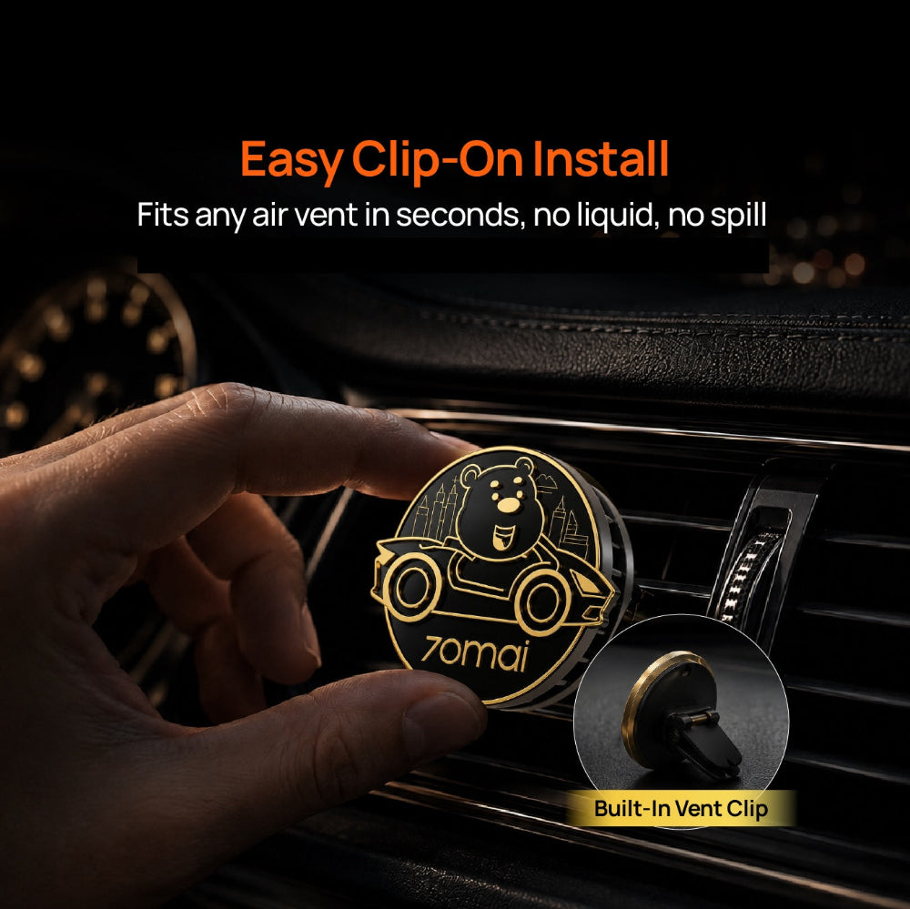70mai car perfume vent clip with bear logo, shown being installed in an air vent